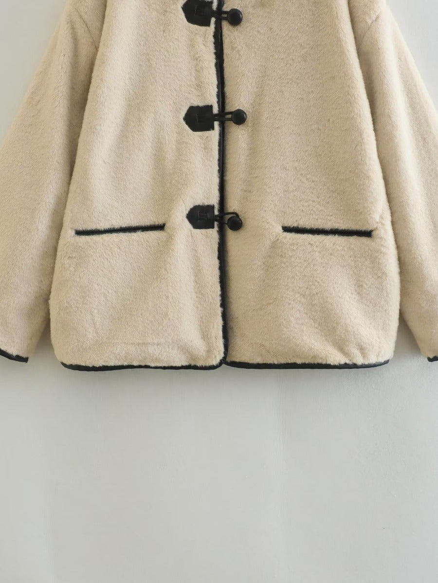 Manteau chaud en laine d'agneau à simple boutonnage